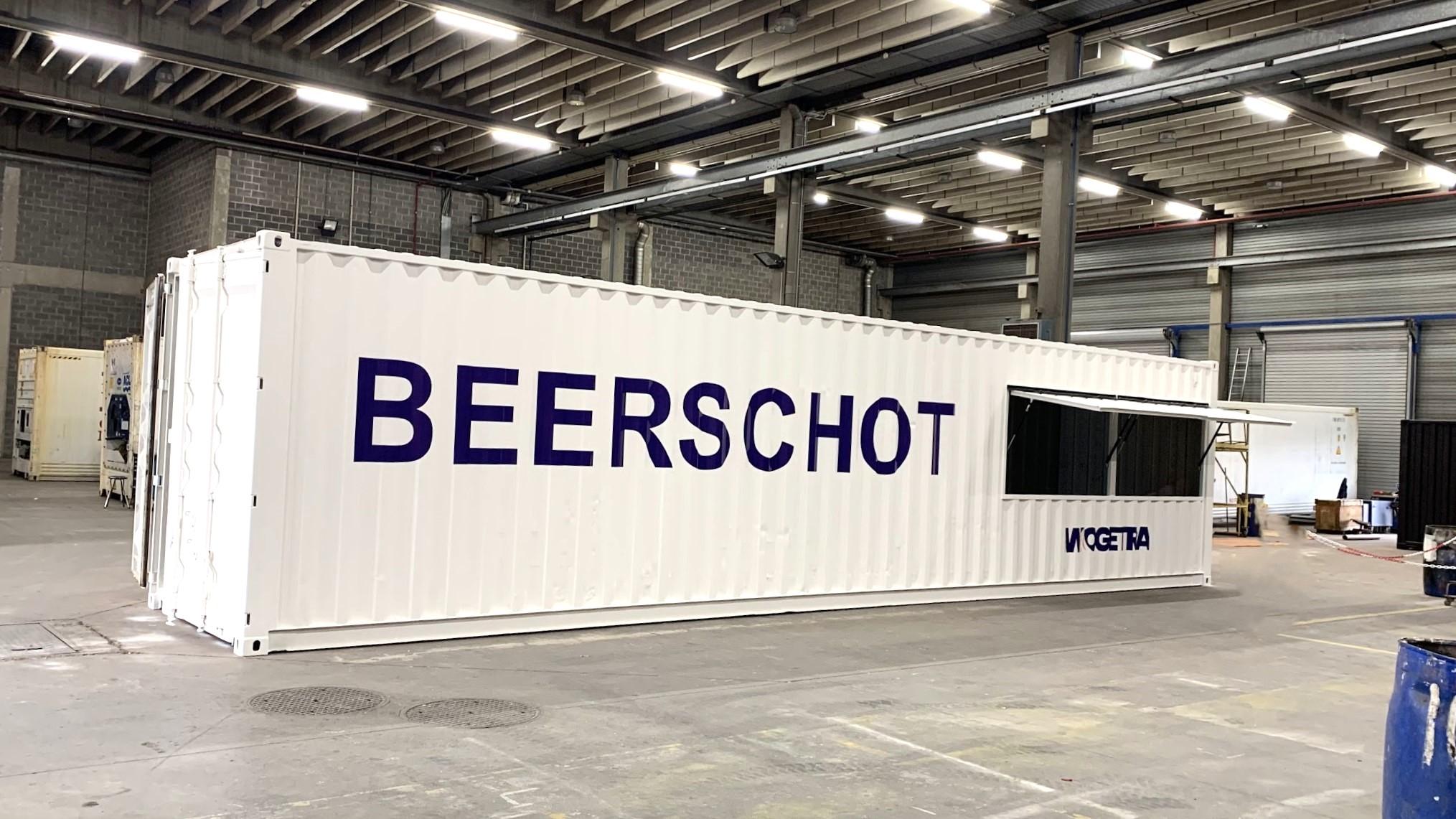 White 40 foot custom made Beerschot football club bar container with company branded sticker logo and opening hatch for alcohol