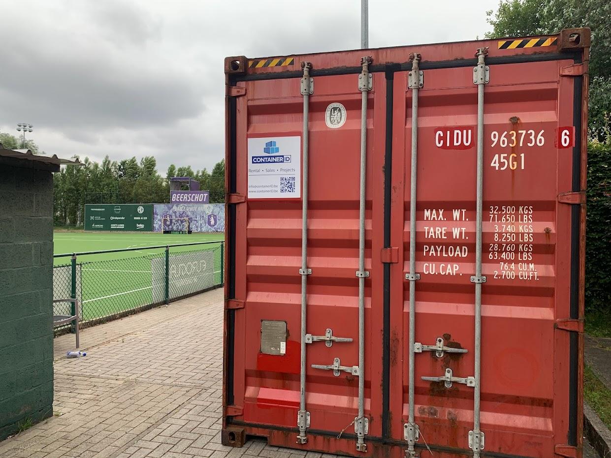 Front door of Red 40 foot high cube used storage stock container for Beerschot hockey club for events and tournaments for sale or hire by ContainerID