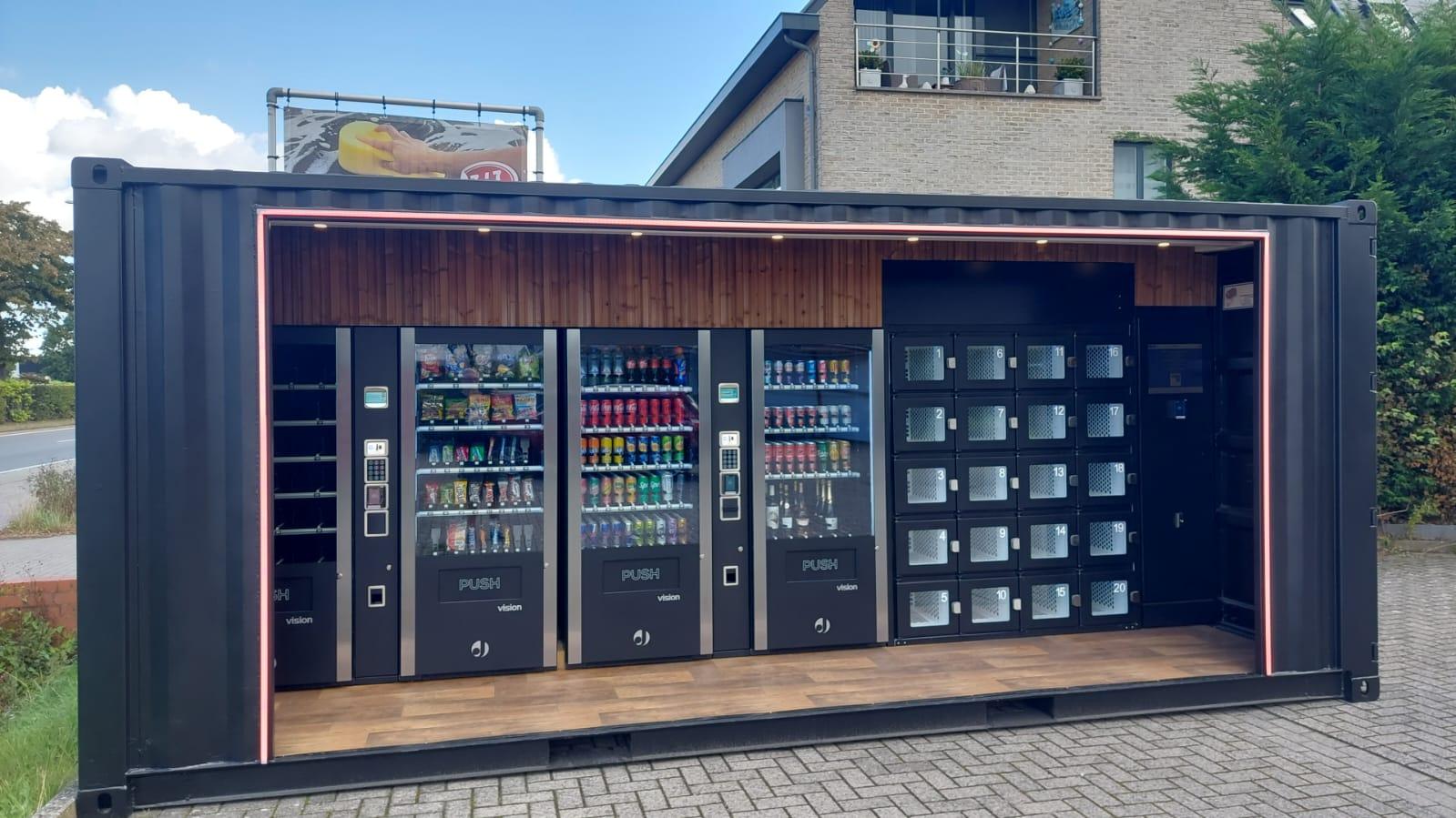 20 foot mobile vending machine for soft drinks, food, snacks and alcohol with custom yellow LED lights and open side in Antwerp