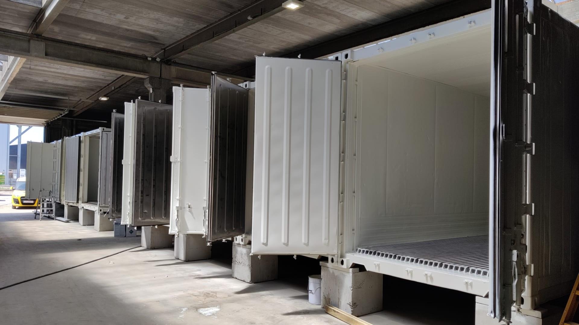 Inside Seven 40 foot white Custom refrigerated reefer container solution modified for the development of sea life in temperature controlled containers 