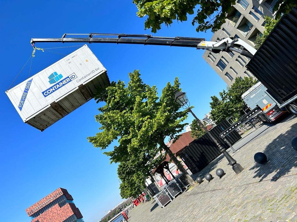 20 foot custom ContainerID refrigerated reefer container for sale or rent at Drip festival on crane delivered for the cooling of beverages in Antwerp central